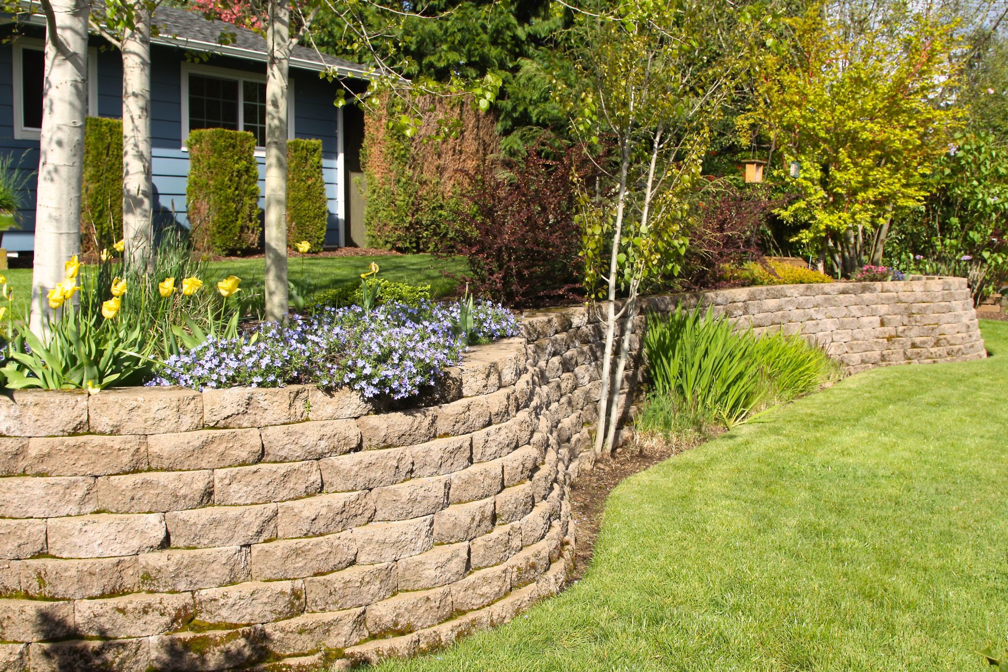 Signs Your Slope May Require a Retaining Wall